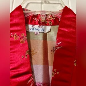 Red silky bathrobe size 16.